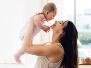 Happy mother with baby