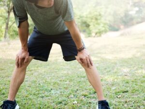 Man with knees slightly bent