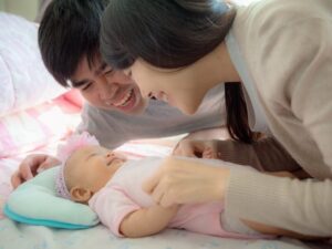 Parents bonding with baby